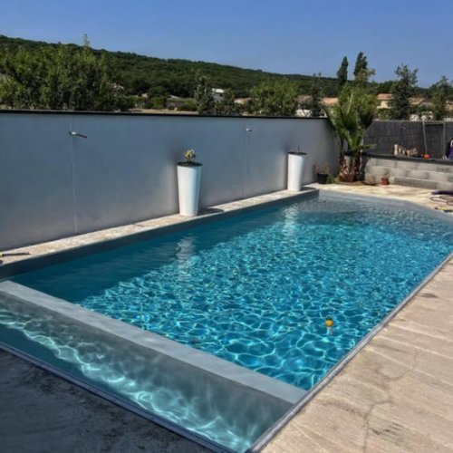 Rénovation complète d'une piscine de 8 × 4 m